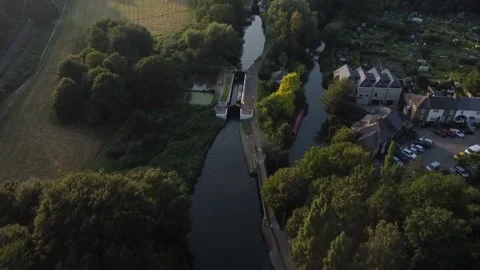 Aerial footage of Grand Union Canal in London United Kingdom in golden hour Stock Footage