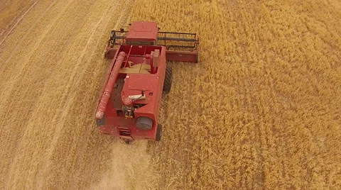 Aerial footage of Harvester fly pass Stock Footage 45506953