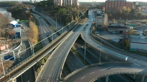 Aerial footage of highway freeway intersectionin urban city environment Stock Footage 143501855