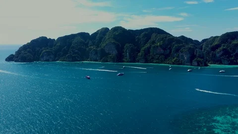 Aerial footage of Koh Phi Phi Don Western Ton Sai bay cliffs overlooking crys Stock Footage 124273106