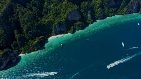 Aerial footage of Koh Phi Phi Don Western Ton Sai bay cliffs overlooking crys Stock Footage 124273843