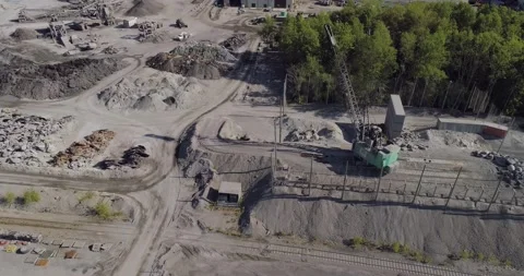 Aerial Footage of Large Metal Processing Facility Mineral Stockyard Activity 5 Stock-Footage 167561271