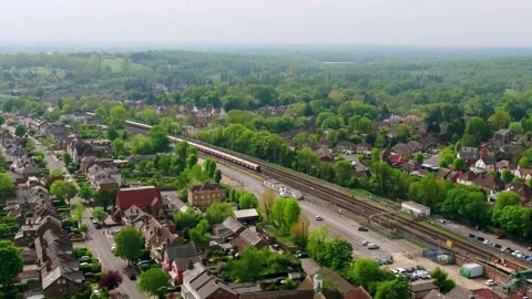 Aerial Footage of London Underground trains passing through Stock Footage