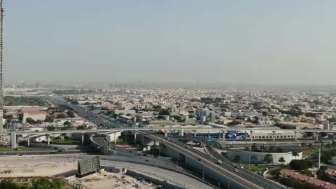 Aerial footage of a massive multi level intersection on a highway in Dubai, 4k Stockbeeldmateriaal 151996937