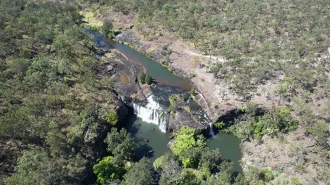 Aerial footage of Millstream Falls 스톡 동영상 220639416
