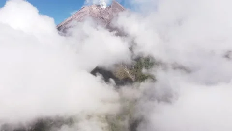 Aerial Footage of Mount Merapi Rising Through the Mist Stock Footage 292284783
