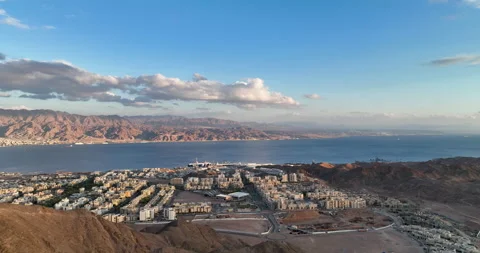 Aerial footage of the mountains of Eilat, In the background eilat city Stock Footage 237493984