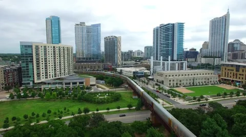 Aerial Footage - Moving Train While Flying In Reverse Video stock 64233457