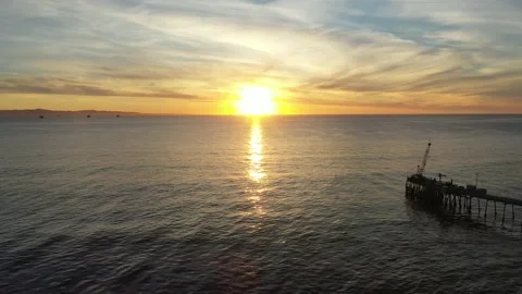 Aerial Footage of Ocean Waves Rolling In During Sunset Stock Footage 150730737