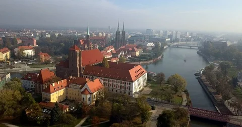 Aerial footage of Oder River in Wroclaw on a sunny morning Stock Footage 119041999