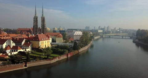 Aerial footage of Oder River in Wroclaw on a sunny morning Stock Footage 119042038