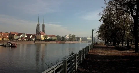 Aerial footage of Oder River in Wroclaw on a sunny morning Stock Footage 119042039