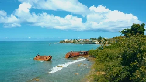 Aerial footage of Puerto Rican Beach Town on the sea. Stock Footage