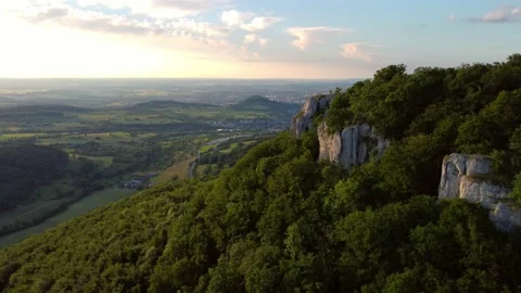 Aerial footage of reverse flight alongside scenic cliffs Stock Footage 223209264