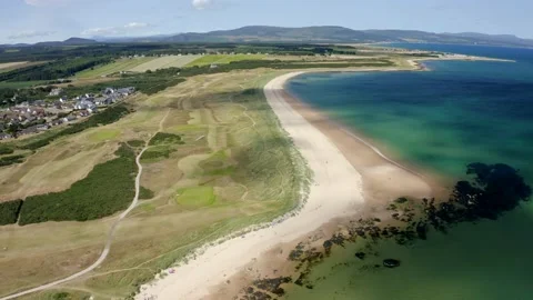 Aerial footage of Royal Dornoch golf course in Scotland, UK Stock Footage