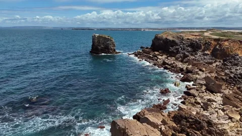 Aerial Footage of a Sea Stack Rock Formation Off the Portugal Coast Vídeos de archivo 345841115