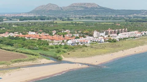 Aerial footage showcasing Platja de Pals beach in Begur, Spain, with sandy Stock Footage 346703553