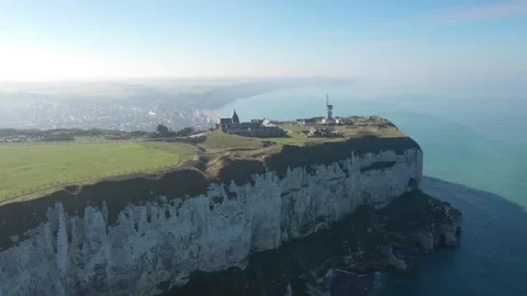 Aerial footage showing the dramatic white chalk cliffs of Fecamp on the Normandy Stock Footage 346604148