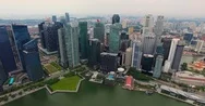 Aerial Footage Of Singapore Skyscrapers With City Skyline. Drone Video In 4K Stock Footage