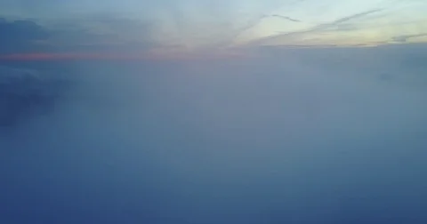 Aerial Footage of A Sunset Through The Clouds Vídeo Stock 75978682