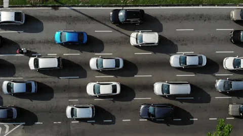 Aerial footage top down of the vehicle passing during the traffic jam Stock Footage