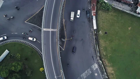 Aerial footage top down view of multi lane turning road Stock Footage 155198219