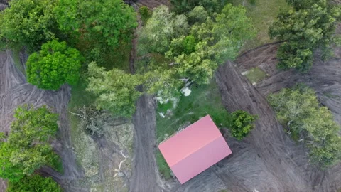 Aerial footage of tractor working in a yard Stock Footage 169030307