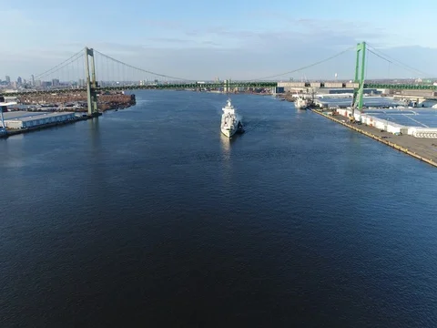 Aerial Footage of Tugboat and Cargo Ship on Delaware River Philadelphia PA Stock Footage