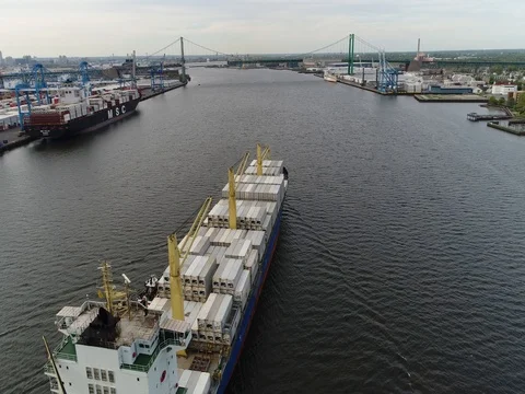 Aerial Footage of Tugboat and Cargo Ship on Delaware River Philadelphia PA Stock Footage