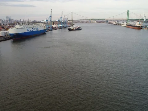 Aerial Footage of Tugboat Pulling Barge on Delaware River Philadelphia PA Stock Footage 72170491
