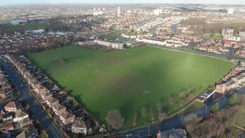 Aerial footage of a Uk School Football pitch Stock Footage