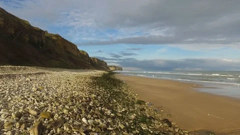 Aerial footage of Utah Beach coastline in Normandy, France Stock Footage
