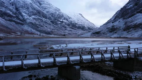 Aerial footage of the valley of glen coe in winter Stock Footage