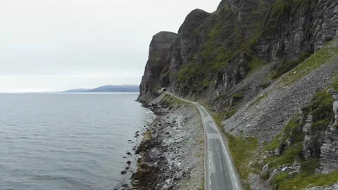 Aerial Footage: Van On Costal Road with Fjord and Mountains in Norway (Graded) Stock Footage