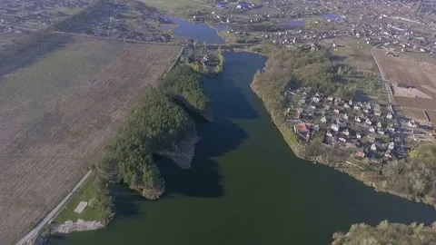 Aerial footage. Village and forest near lakes Stock Footage