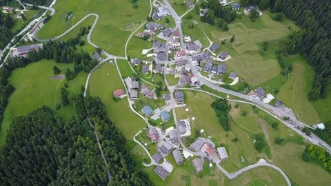 AERIAL FOOTAGE VILLAGE IN THE MOUNTAINS Stock Footage