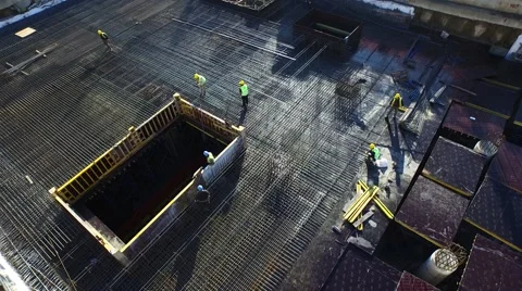Aerial Footage of Workers Working on a Construction Stock Footage 60765619