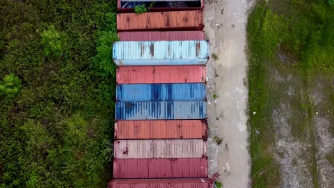 Aerial footage zoom in of rust container Stock Footage