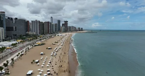 Aerial: Fortaleza cityscape with high rises and beach during the day in the Video stock 311174341