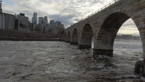 Aerial Forward Ascend: Bridge over canal by downtown against sky - Minneapolis,  Stock Footage 149286815