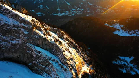 Aerial Forward Beautiful View Of Forest On Snowy Mountains During Sunset - Stock Footage 167823540