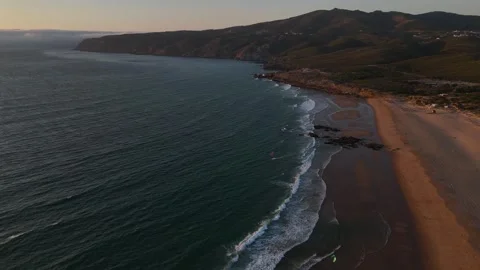 Aerial Forward Descending Scenic View Of Praia Do Guincho Beach, Portugal Stock Footage 314743333