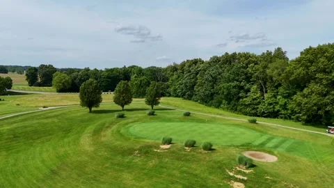 Aerial Forward Drone Push Over Empty Golf Putting Green and Trees Stock Footage 337637688