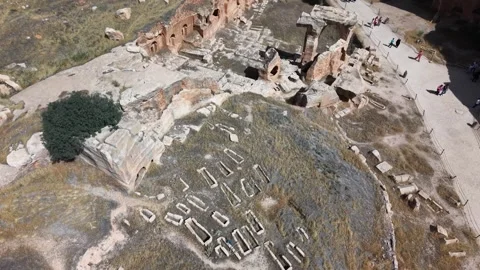Aerial Forward Drone Shot Over Ancient Tombs, Temples and Cave Structures in Vídeo Stock 334798443