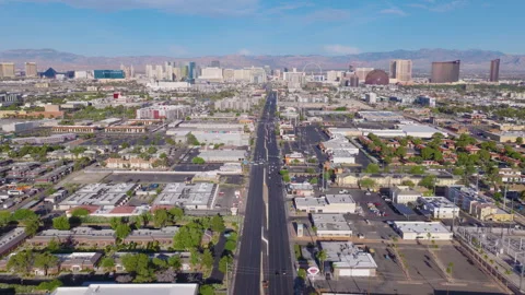 Aerial forward drone view of Las Vegas suburbs and city skyline and streets Stock Footage 333487781