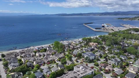 Aerial forward flight across James Bay District, Victoria, BC westbound to Ogden Stock Footage 276334099