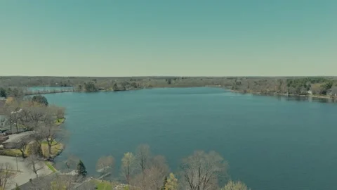 Aerial Forward Flight North Twin Lake Amery Wisconsin USA Early Spring Clear Sky Stock Footage 337227585