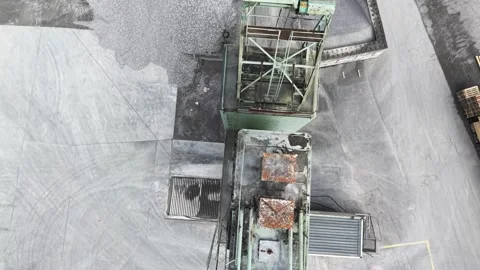 Aerial forward flight over cement silo and sand piles at industrial plant 스톡 동영상 329933203
