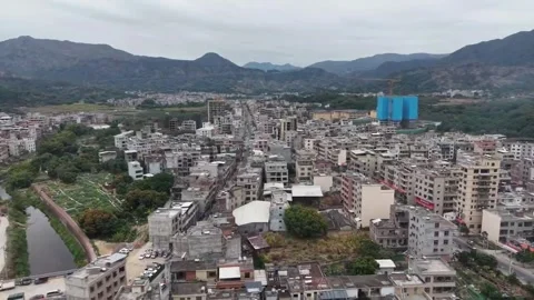 Aerial Forward Flight over Densely Populated Town in Southern China. Video stock 330383379