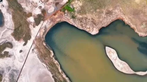 Aerial forward flight over river delta with small islands and colorful shoreline Stock Footage 322941397